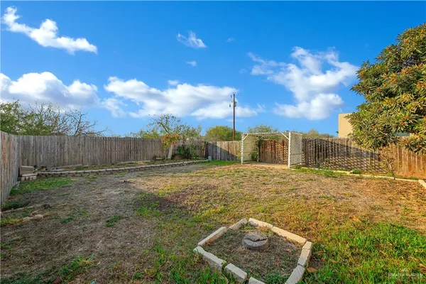 an aerial view of houses with city