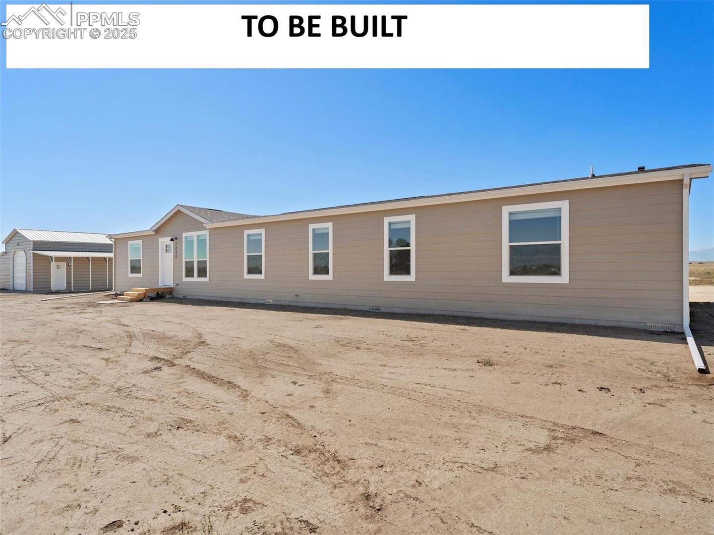 22843 Handle Road Calhan, CO 80808 - Photo 1 of 47 Back of property with an outbuilding