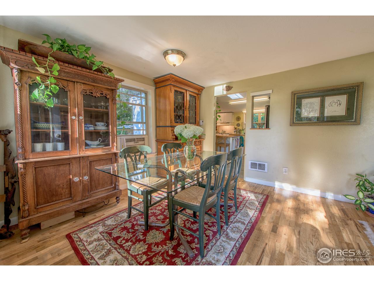 1065 Cherryvale Road Boulder, CO 80303 - Photo 5 of 24 a view of a dining room with furniture window and outside view