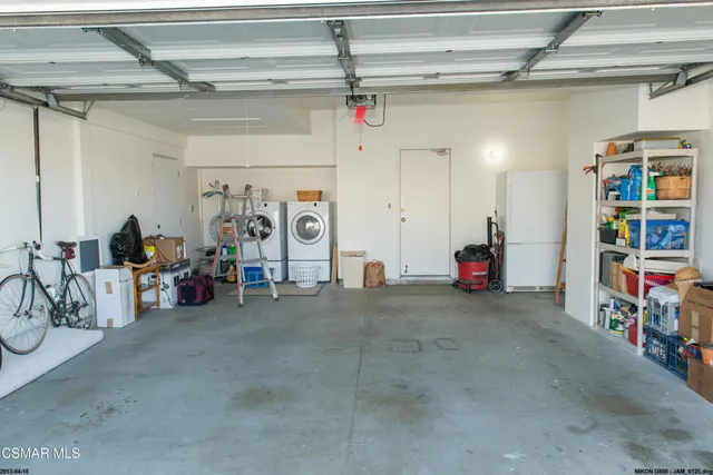 a view of a garage with storage