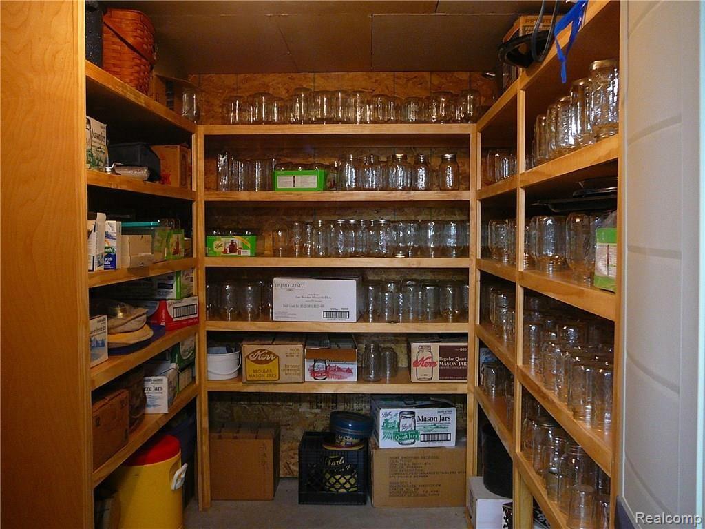 651 Burkley Road Mason, MI 48854 - Photo 35 of 47 Storage room/pantry in basement