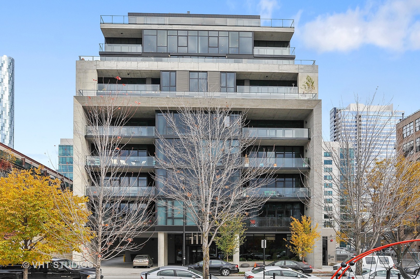 111 South Peoria Street, Unit 804 Chicago, IL 60607 - Photo 1 of 33 a front view of a building with streets