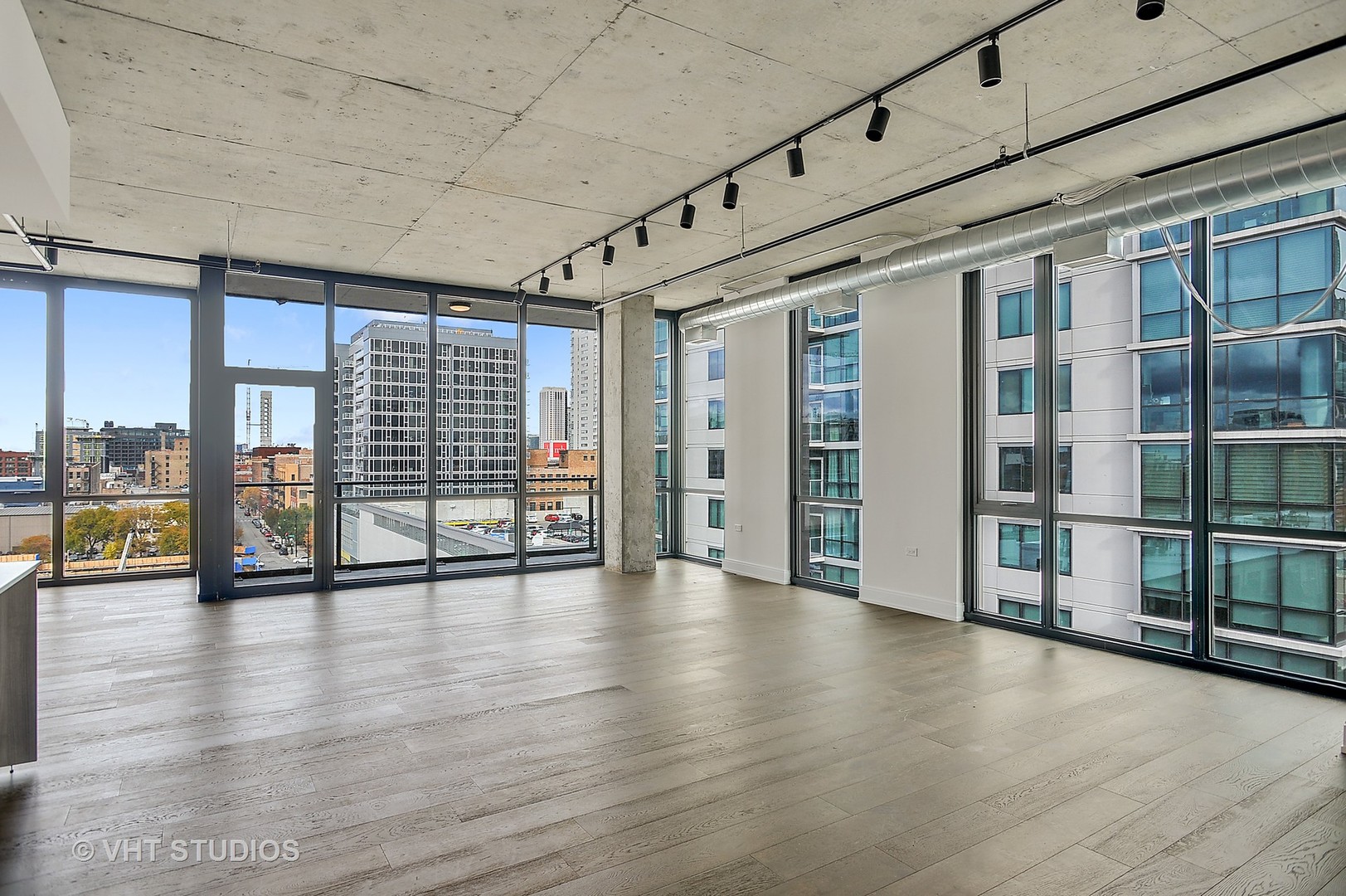 111 South Peoria Street, Unit 804 Chicago, IL 60607 - Photo 2 of 33 a view of an entryway with wooden floor