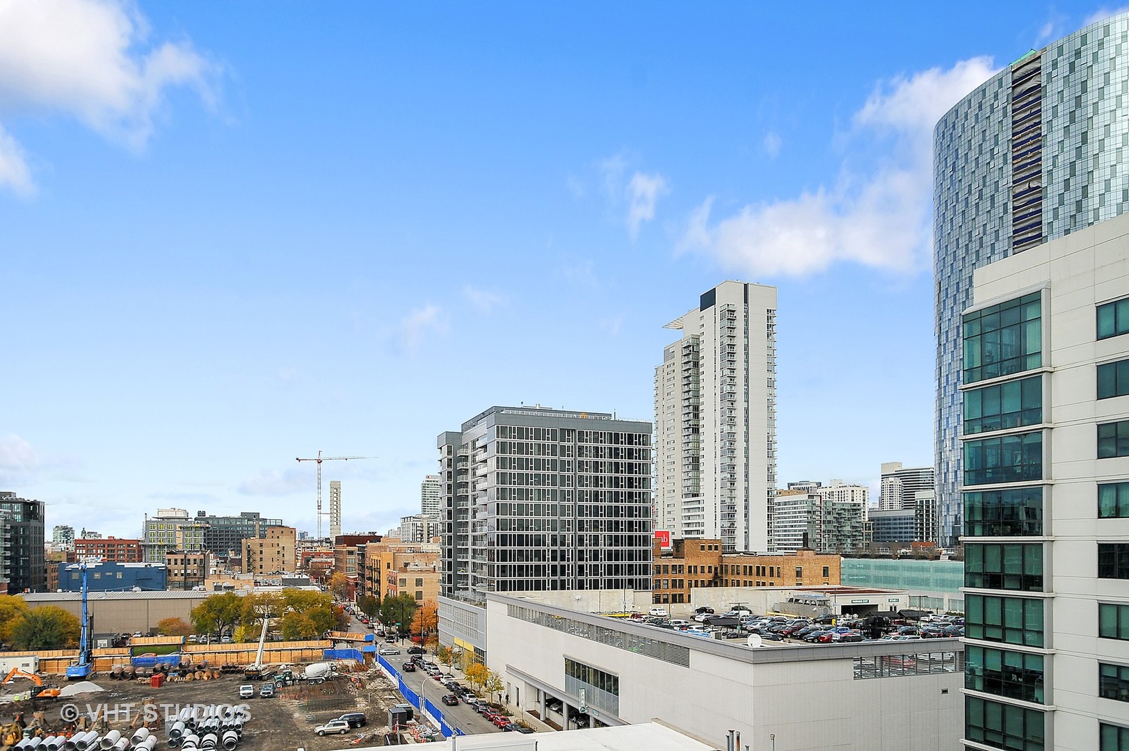 111 South Peoria Street, Unit 804 Chicago, IL 60607 - Photo 30 of 33 a city view with tall buildings