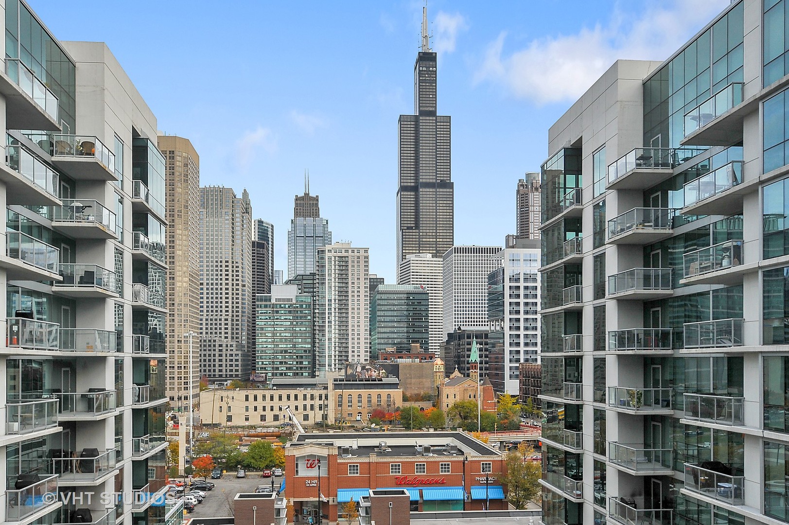 111 South Peoria Street, Unit 804 Chicago, IL 60607 - Photo 32 of 33 a city street filled with lots of tall buildings