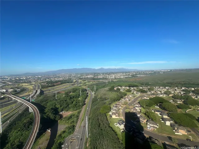 a view of a city with tall buildings