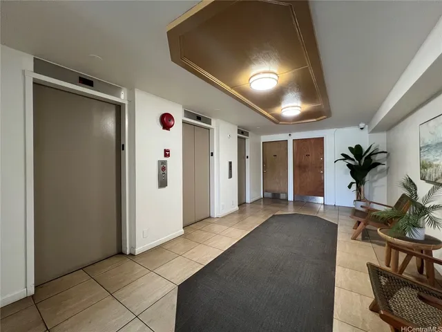 a view of livingroom with furniture and closet