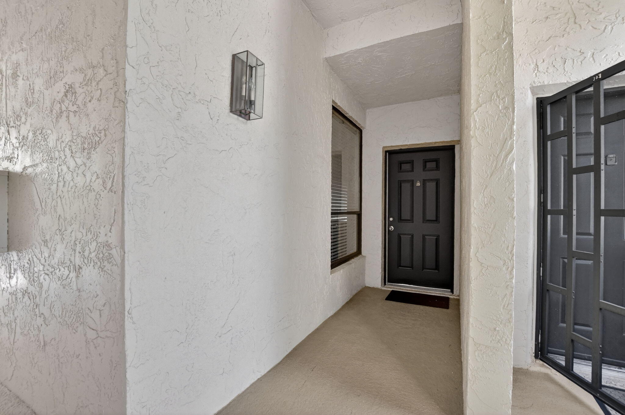 7472 La Paz Boulevard, Unit 304 Boca Raton, FL 33433 - Photo 2 of 36 a view of walk in closet
