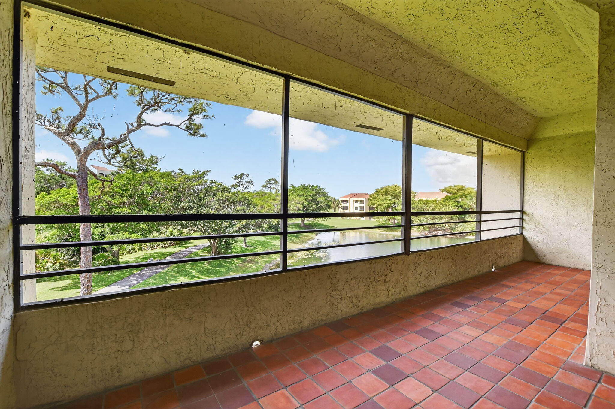7472 La Paz Boulevard, Unit 304 Boca Raton, FL 33433 - Photo 27 of 36 a view of balcony with city view