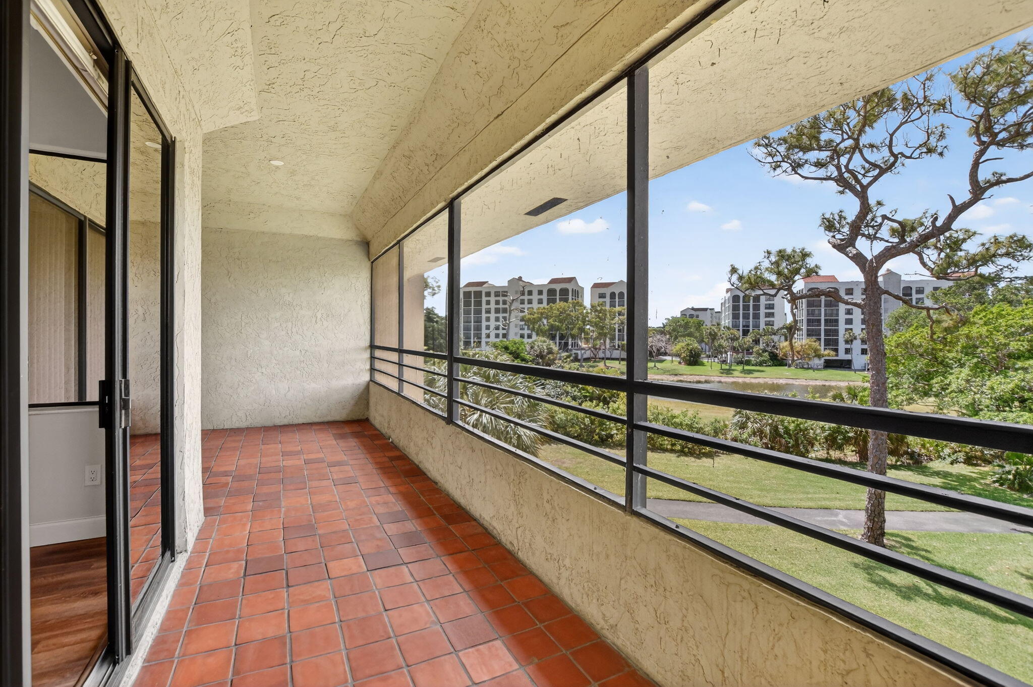 7472 La Paz Boulevard, Unit 304 Boca Raton, FL 33433 - Photo 29 of 36 a view of railway station with sitting area