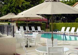 7472 La Paz Boulevard, Unit 304 Boca Raton, FL 33433 - Photo 36 of 36 swimming pool view with a seating space