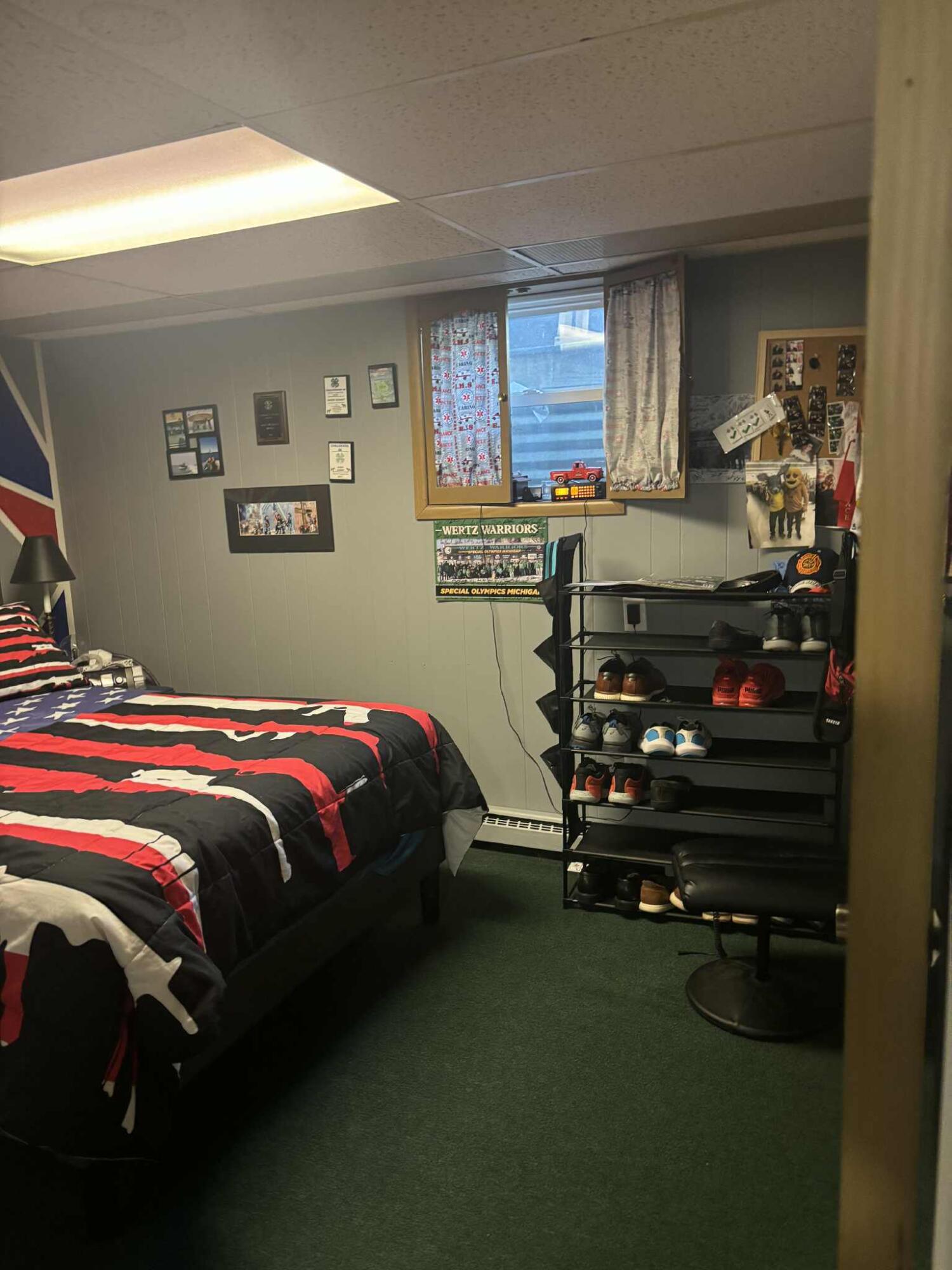 287 West Butler Street Bad Axe, MI 48413 - Photo 18 of 24 lower level bedroom with egress window