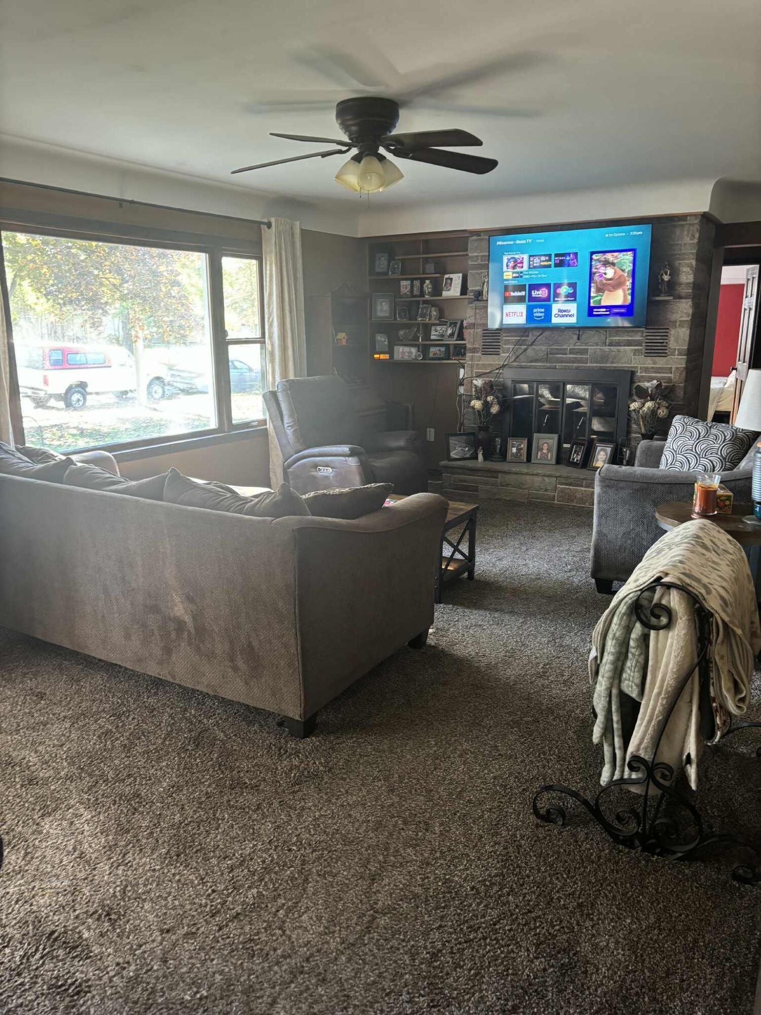 287 West Butler Street Bad Axe, MI 48413 - Photo 7 of 24 living room fireplace never used