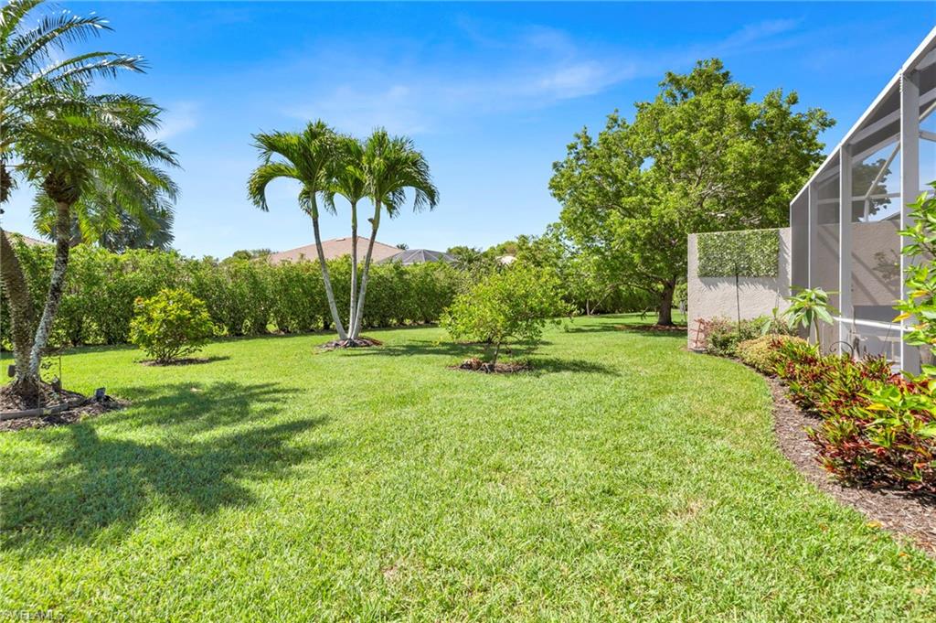 6713 Calumet Drive, Unit 81 Naples, FL 34113 - Photo 3 of 17 Park-Like Setting