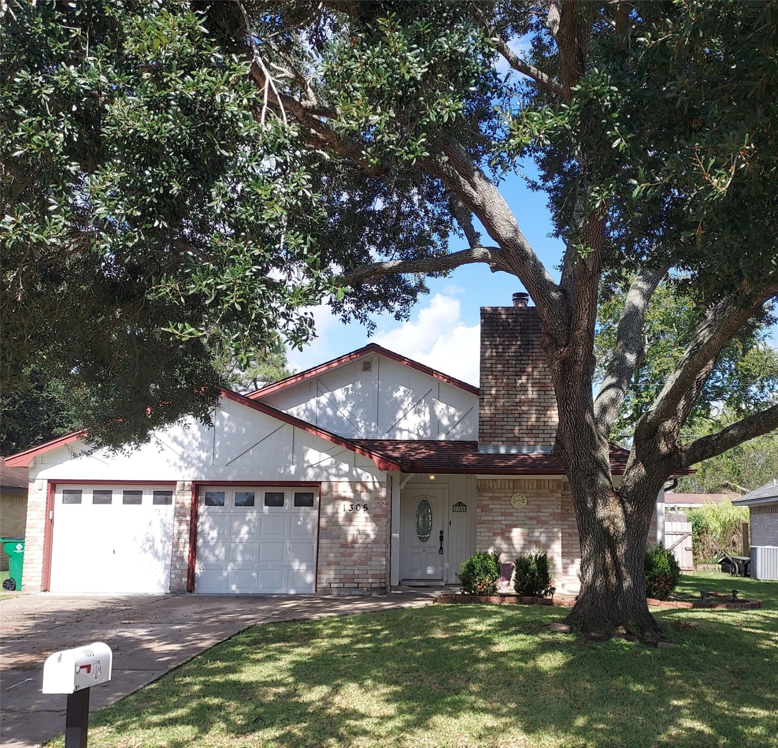 1305 Sagebrush Street Angleton, TX 77515 - Photo 1 of 12 a view of house with yard in front of it