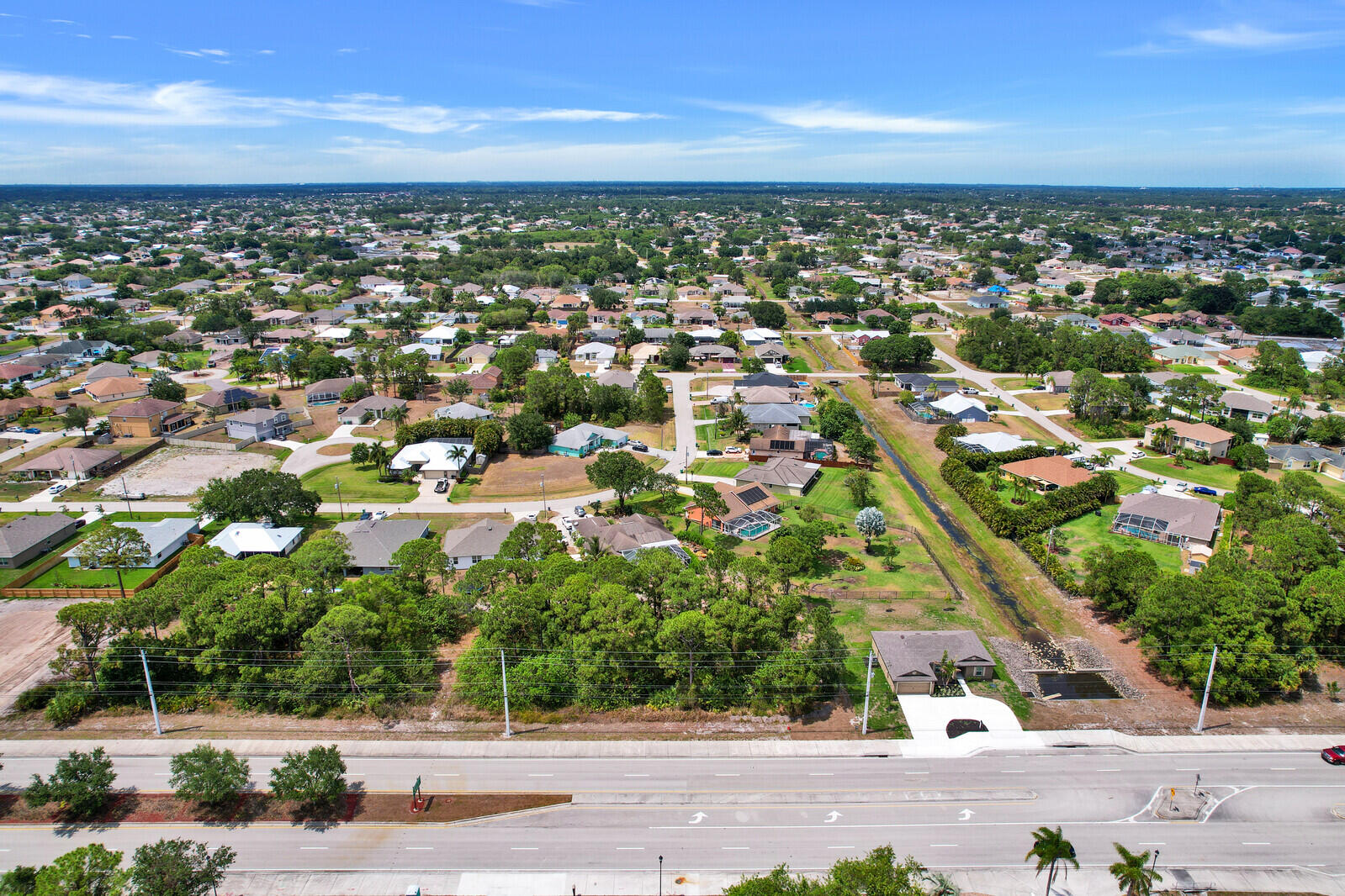 243 Southwest Becker Road Port St. Lucie, FL 34953 - Photo 5 of 20 an aerial view of a city