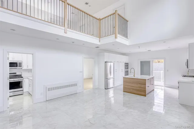 a view of livingroom with furniture and cabinet