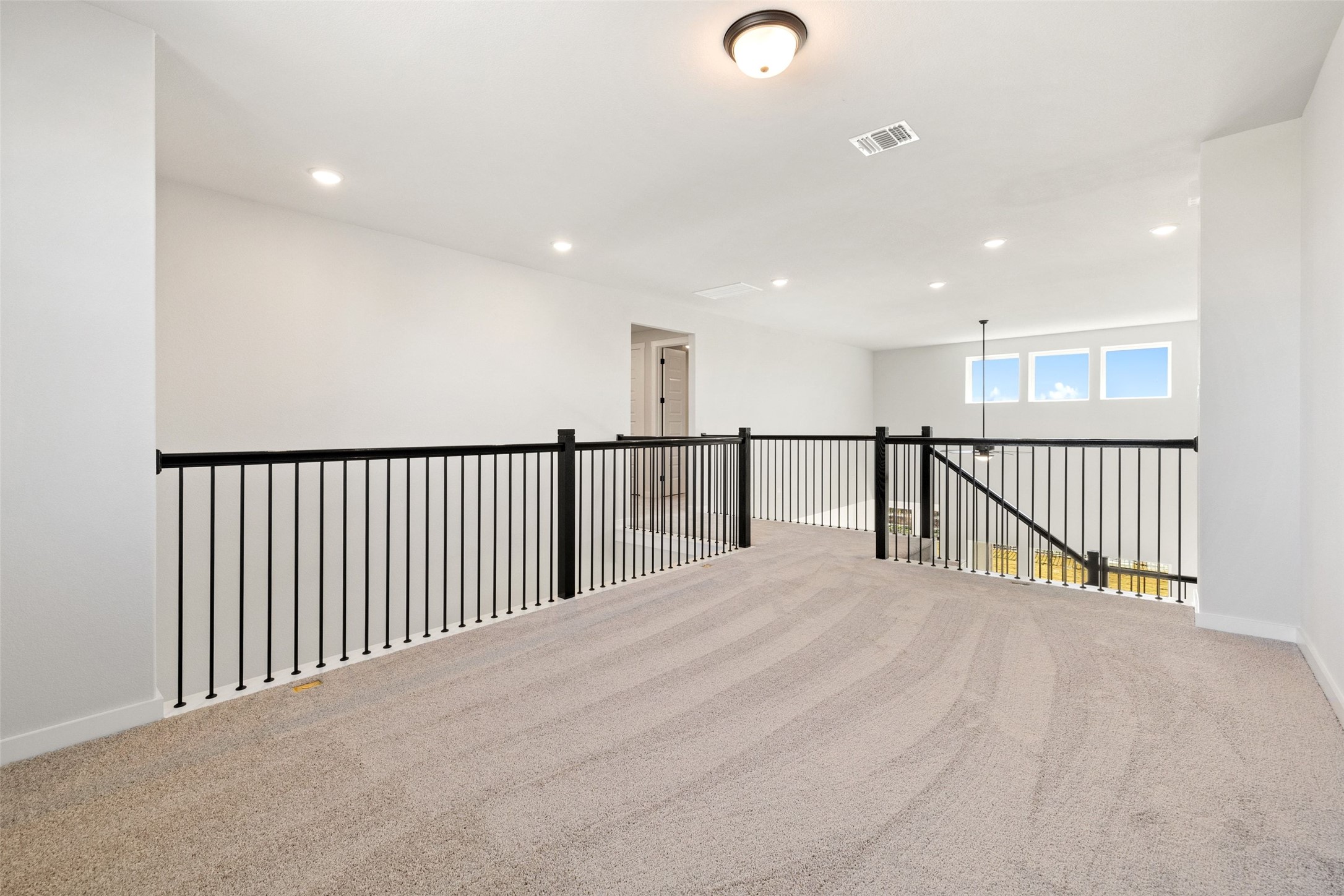 16309 Smithers Road Manor, TX 78653 - Photo 27 of 40 a view of a hallway