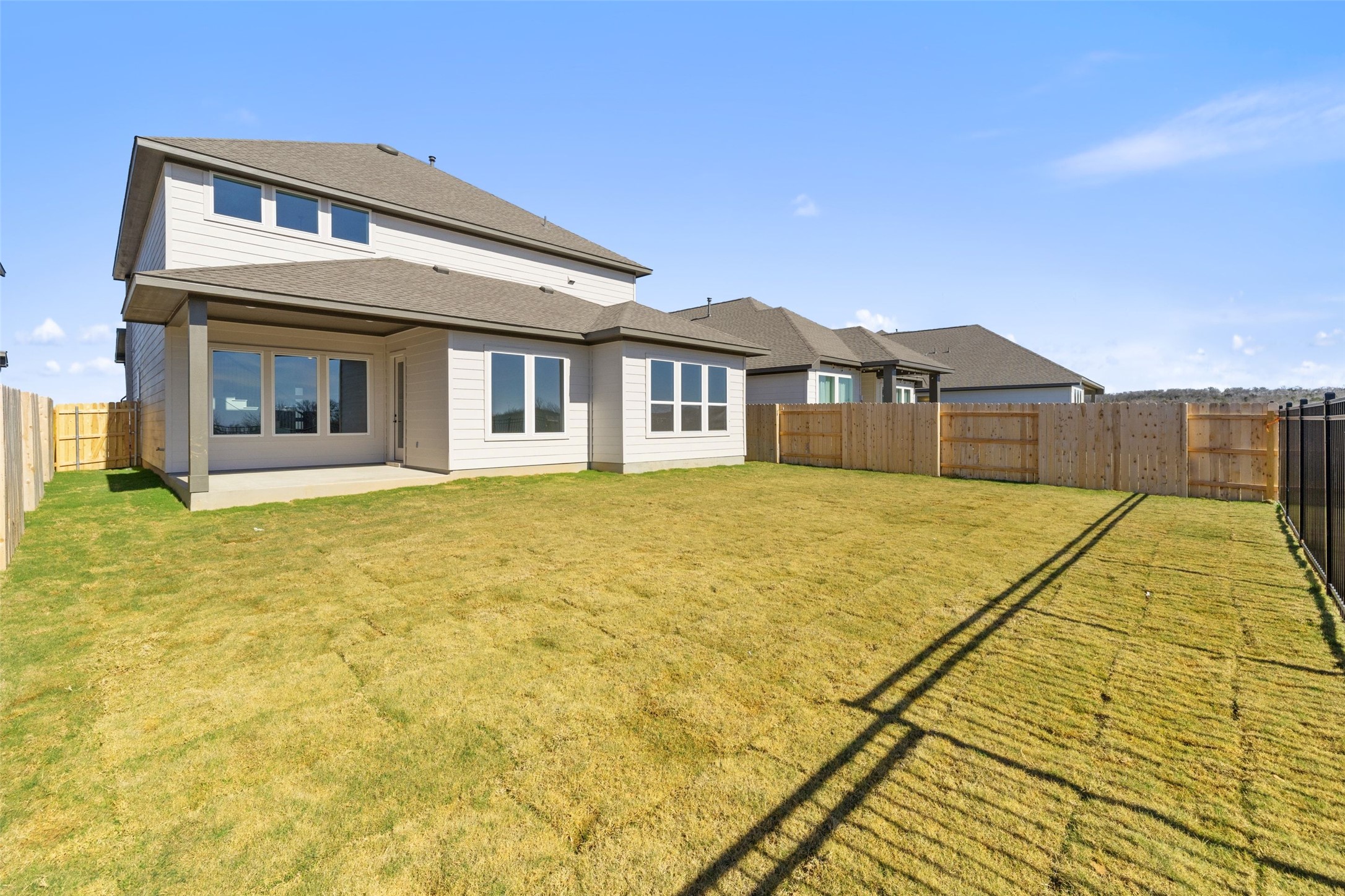 16309 Smithers Road Manor, TX 78653 - Photo 39 of 40 a front view of a house with a yard