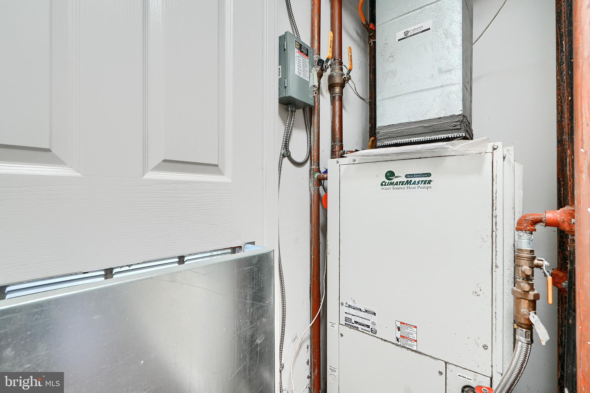 414 Water Street, Unit 1513 Baltimore, MD 21202 - Photo 35 of 43 a view of walk in closet with white walls