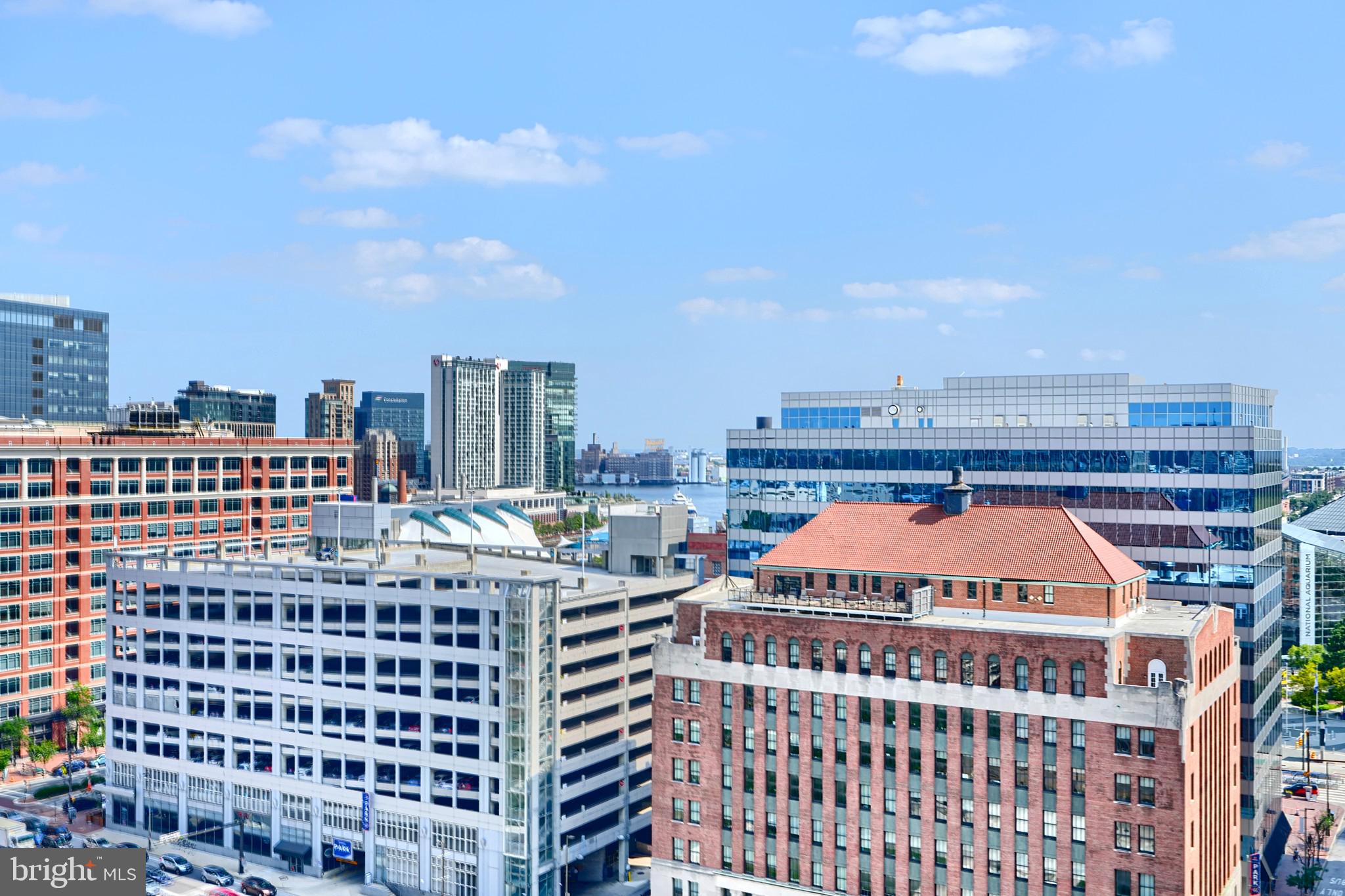 414 Water Street, Unit 1513 Baltimore, MD 21202 - Photo 38 of 43 a large building with a city view