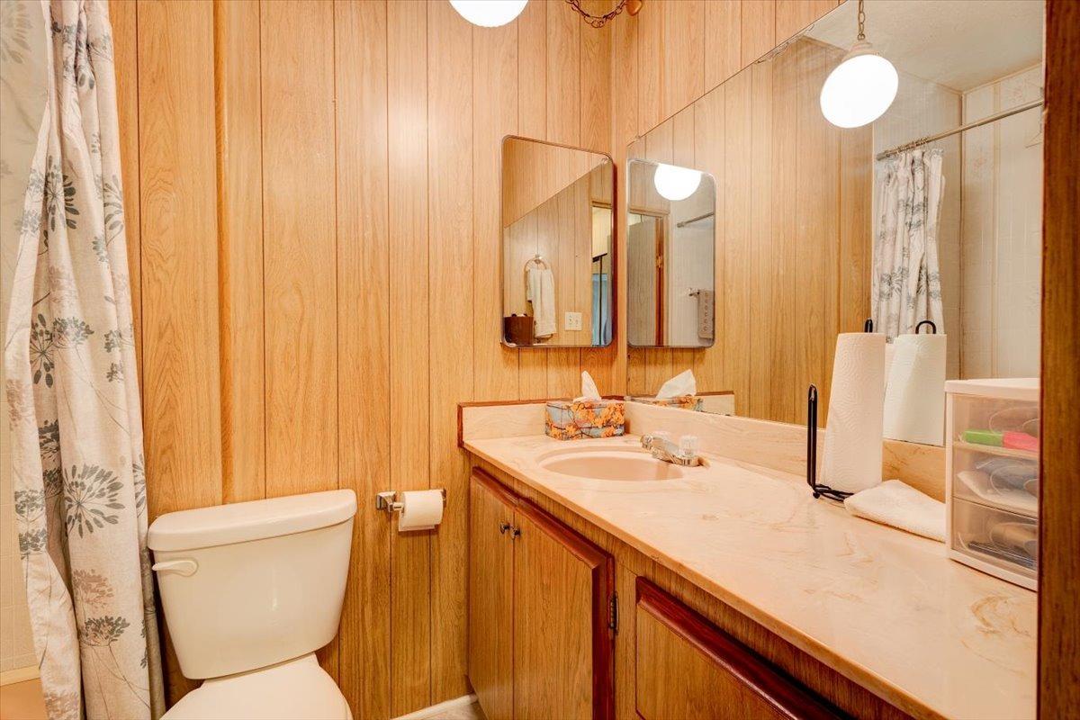 1272 Villa Avenue, Unit SPC56 Clovis, CA 93612 - Photo 21 of 35 a bathroom with a sink a toilet and shower