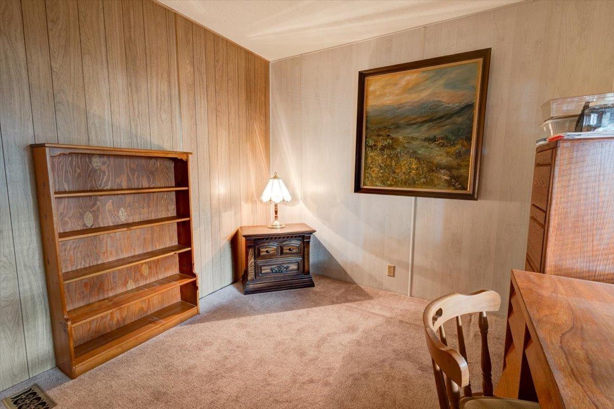 1272 Villa Avenue, Unit SPC56 Clovis, CA 93612 - Photo 23 of 35 a view of a livingroom with furniture and closet