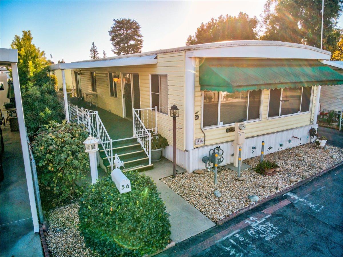 1272 Villa Avenue, Unit SPC56 Clovis, CA 93612 - Photo 25 of 35 front view of a house with a yard