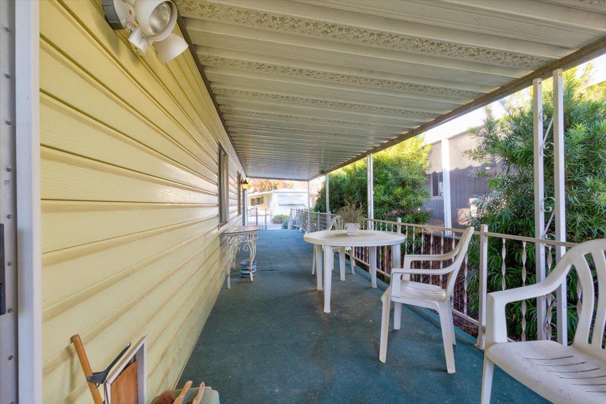 1272 Villa Avenue, Unit SPC56 Clovis, CA 93612 - Photo 28 of 35 a outdoor space with chairs