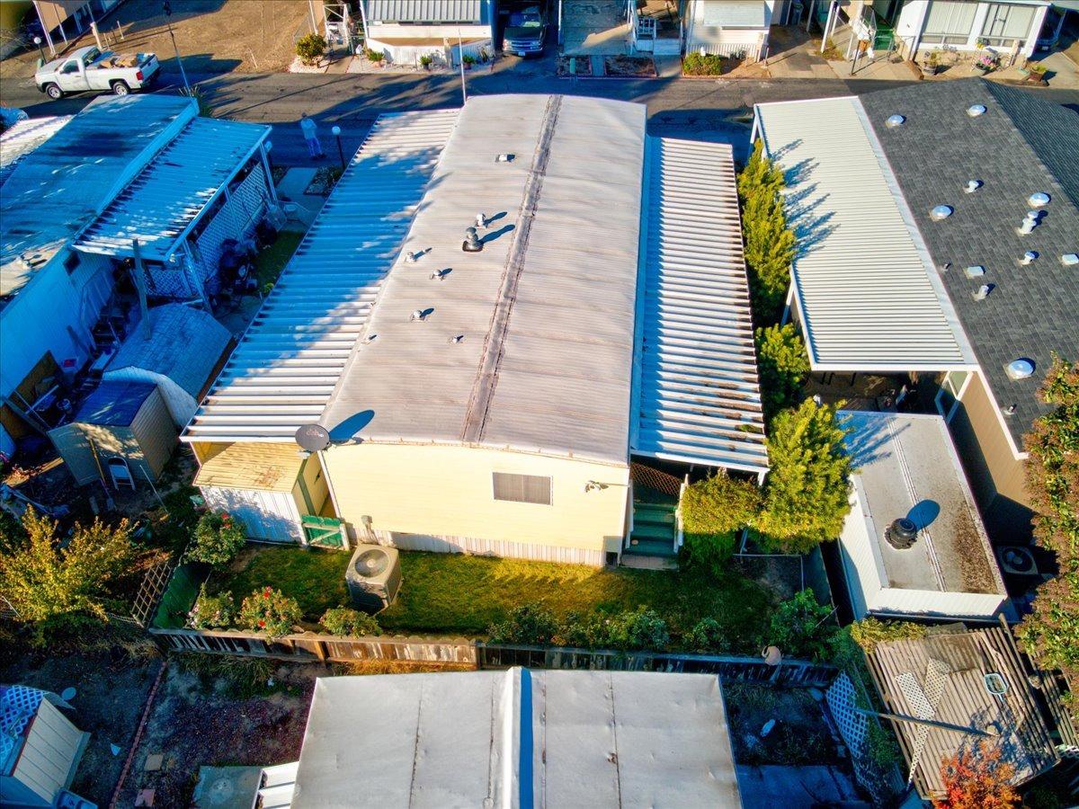 1272 Villa Avenue, Unit SPC56 Clovis, CA 93612 - Photo 34 of 35 an aerial view of a house with swimming pool and patio