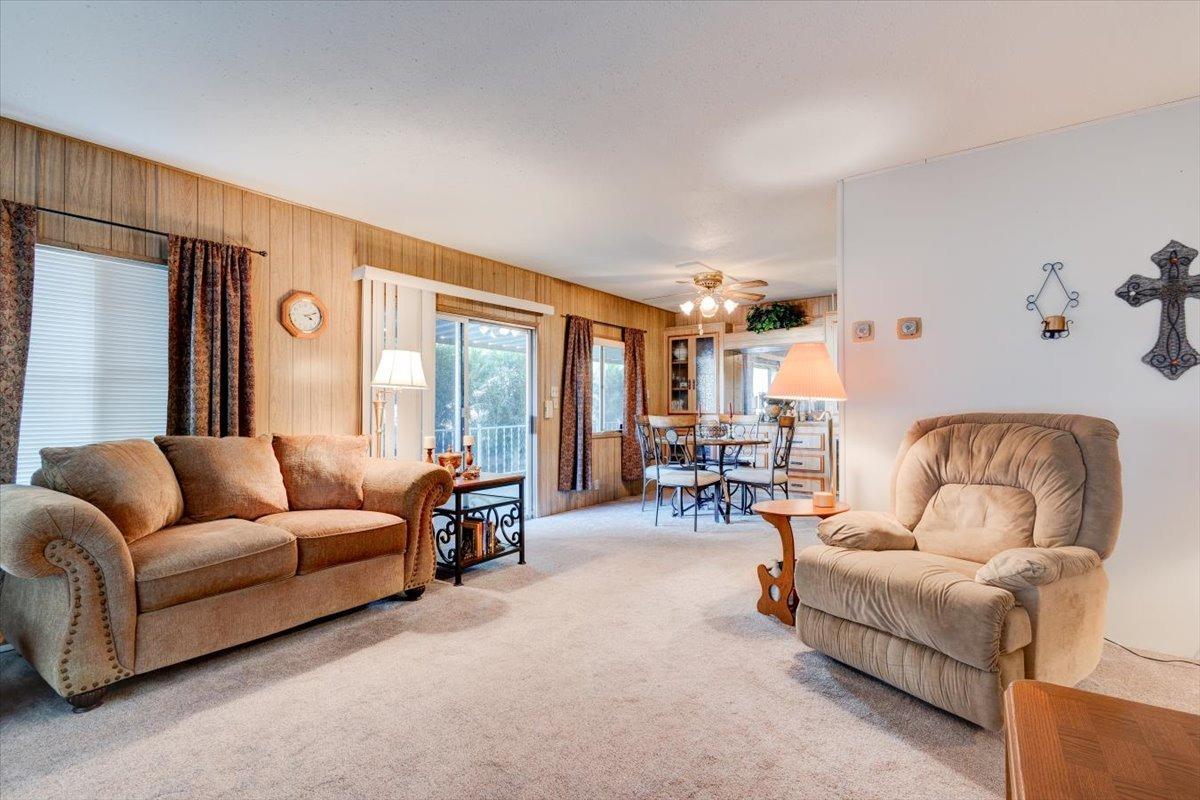 1272 Villa Avenue, Unit SPC56 Clovis, CA 93612 - Photo 8 of 35 a living room with furniture and a large window