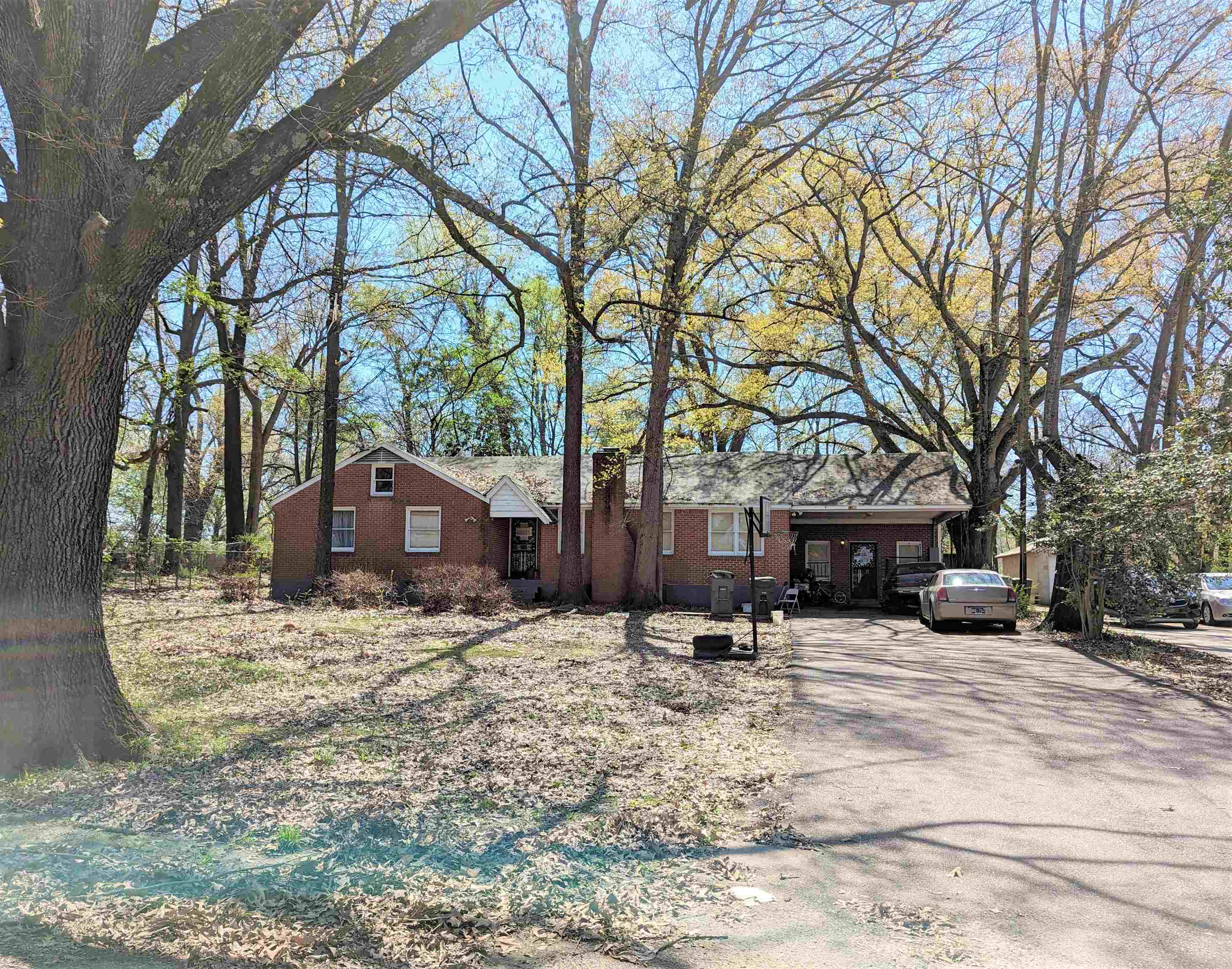 1085 Marlin Road Memphis, TN 38116 - Photo 1 of 1 a view of a house with a yard