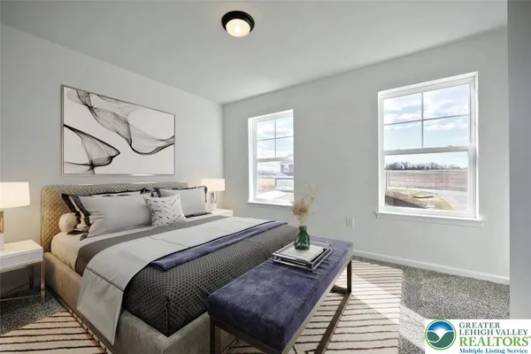 a bedroom with bed and window