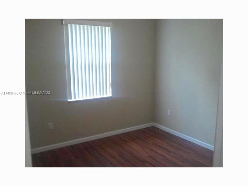 8436 Southwest 29th Street, Unit 101 Miramar, FL 33025 - Photo 12 of 21 a bathroom with a window