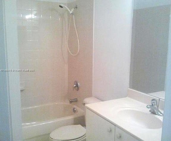 8436 Southwest 29th Street, Unit 101 Miramar, FL 33025 - Photo 13 of 21 a bathroom with a sink toilet and shower