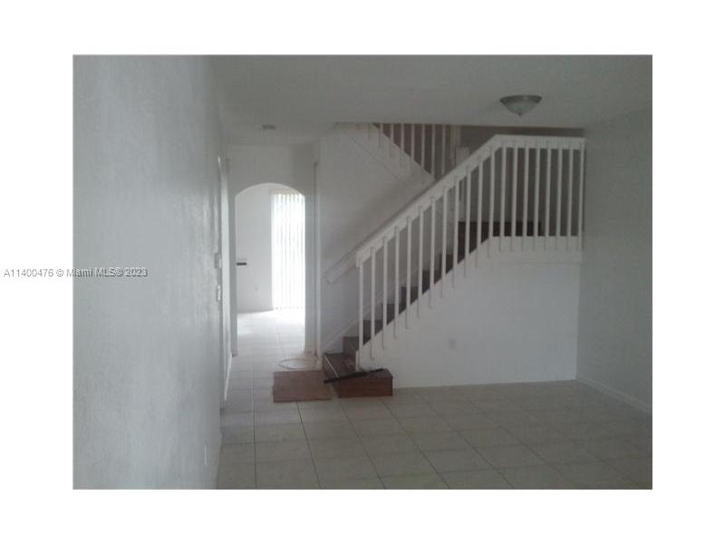 8436 Southwest 29th Street, Unit 101 Miramar, FL 33025 - Photo 2 of 21 a view of entryway and hall