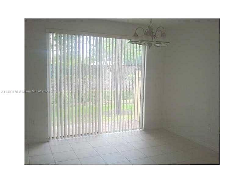 8436 Southwest 29th Street, Unit 101 Miramar, FL 33025 - Photo 6 of 21 a open area with window