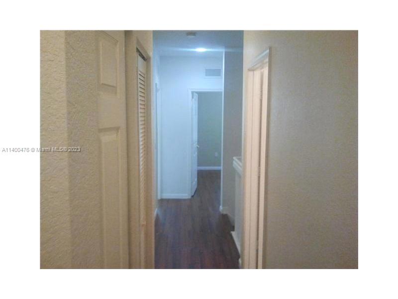 8436 Southwest 29th Street, Unit 101 Miramar, FL 33025 - Photo 9 of 21 a bathroom with a sink and a mirror