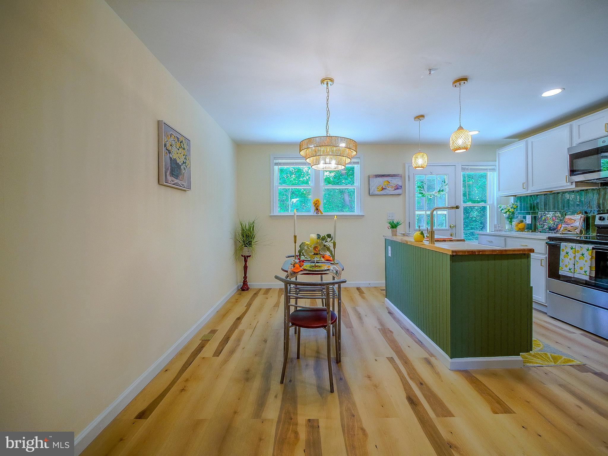 179 Madison Drive Newark, DE 19711 - Photo 12 of 43 a view of a living room and kitchen with furniture