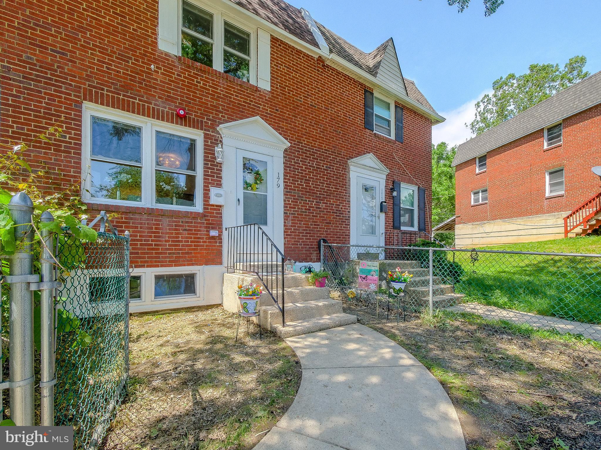 179 Madison Drive Newark, DE 19711 - Photo 2 of 43 a front view of a house with a yard