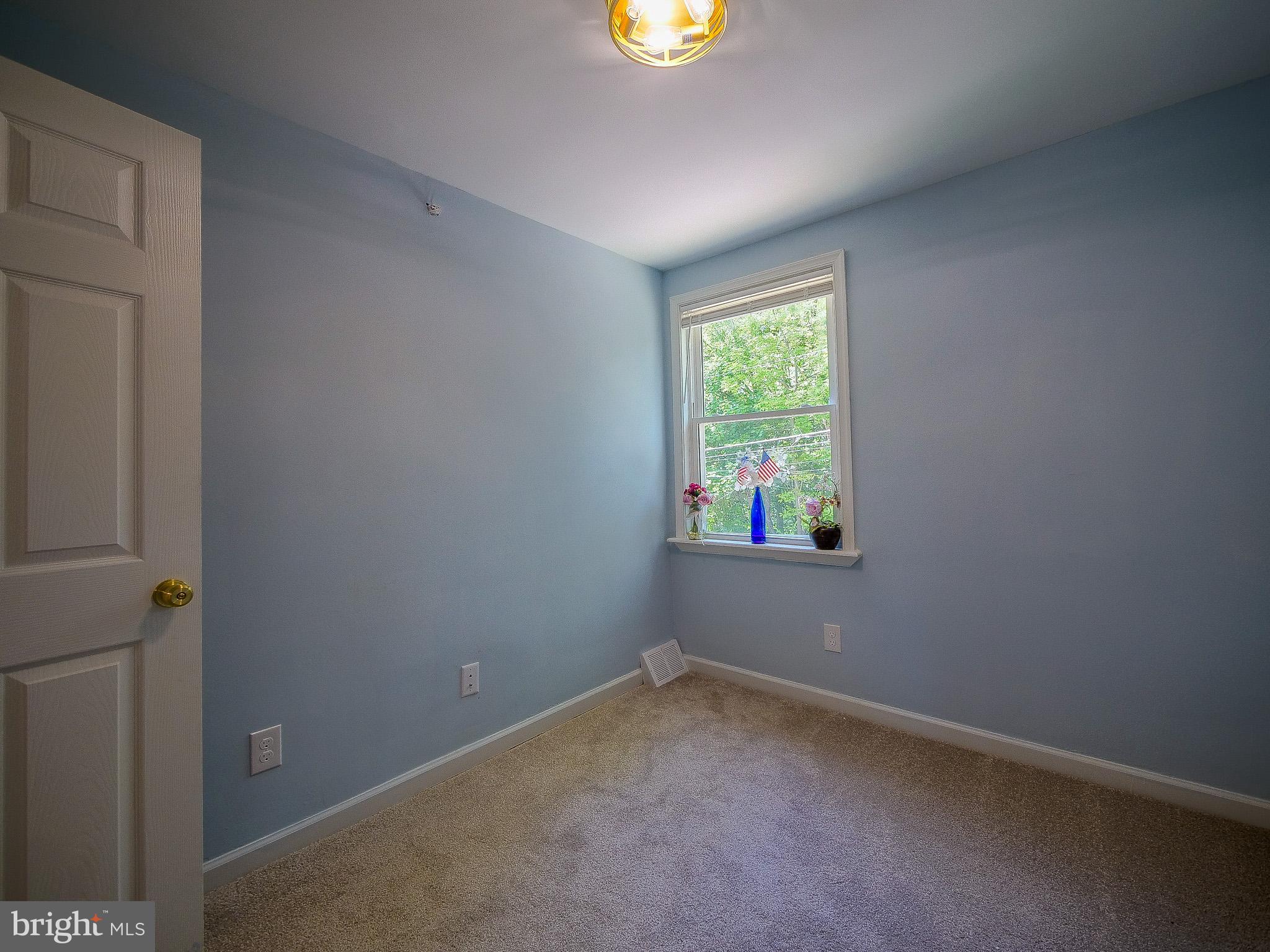 179 Madison Drive Newark, DE 19711 - Photo 27 of 43 an empty room with windows