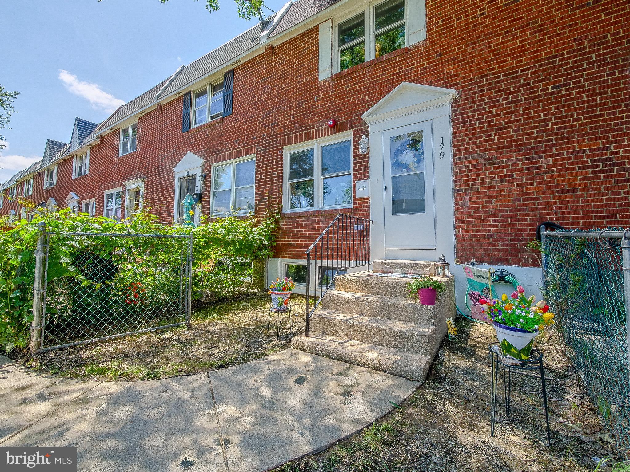 179 Madison Drive Newark, DE 19711 - Photo 3 of 43 a front view of a house with a yard
