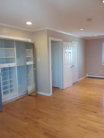 a kitchen with a counter space cabinets and appliances