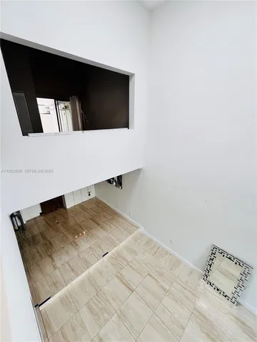 a living room with a bed