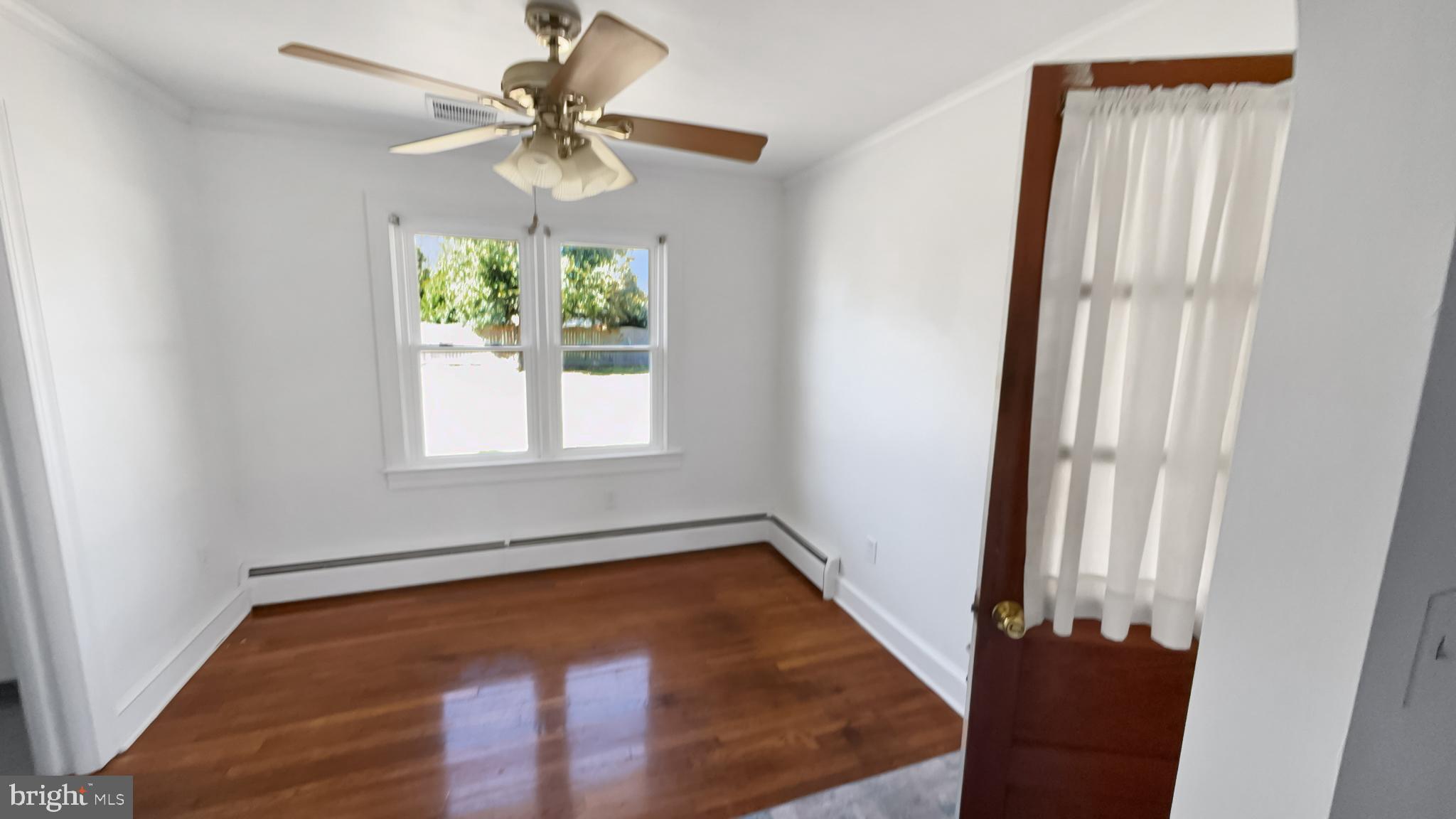 13 Nanticoke Road Cambridge, MD 21613 - Photo 8 of 14 a view of an empty room with a window