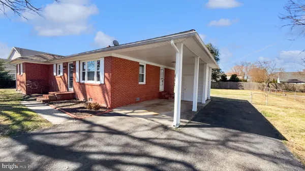 a front view of house with yard