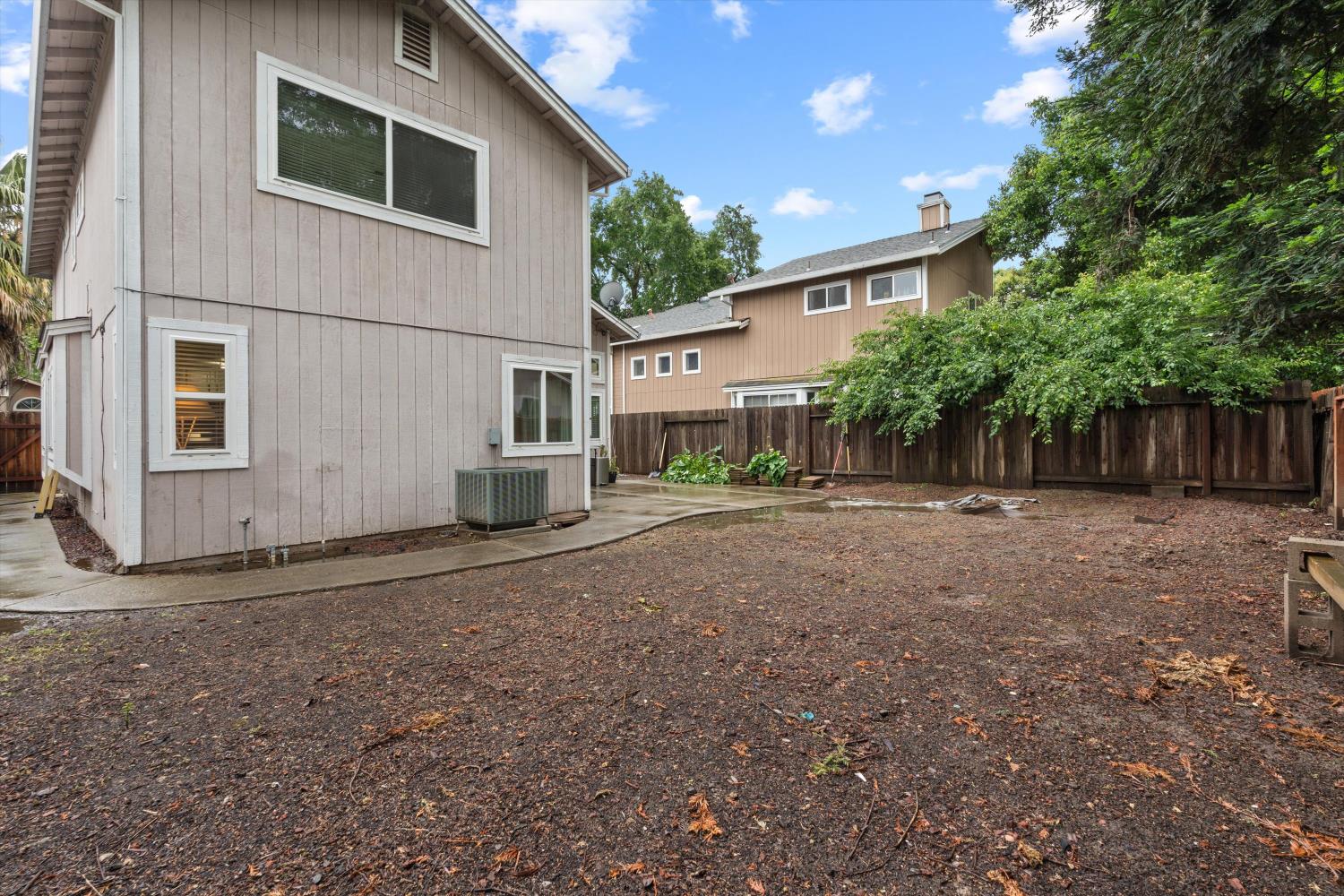8117 Prior Way Antelope, CA 95843 - Photo 26 of 27 a view of a house with backyard and a tree