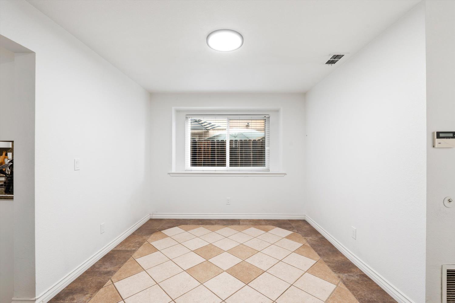 8117 Prior Way Antelope, CA 95843 - Photo 9 of 27 a view of an empty room with a window