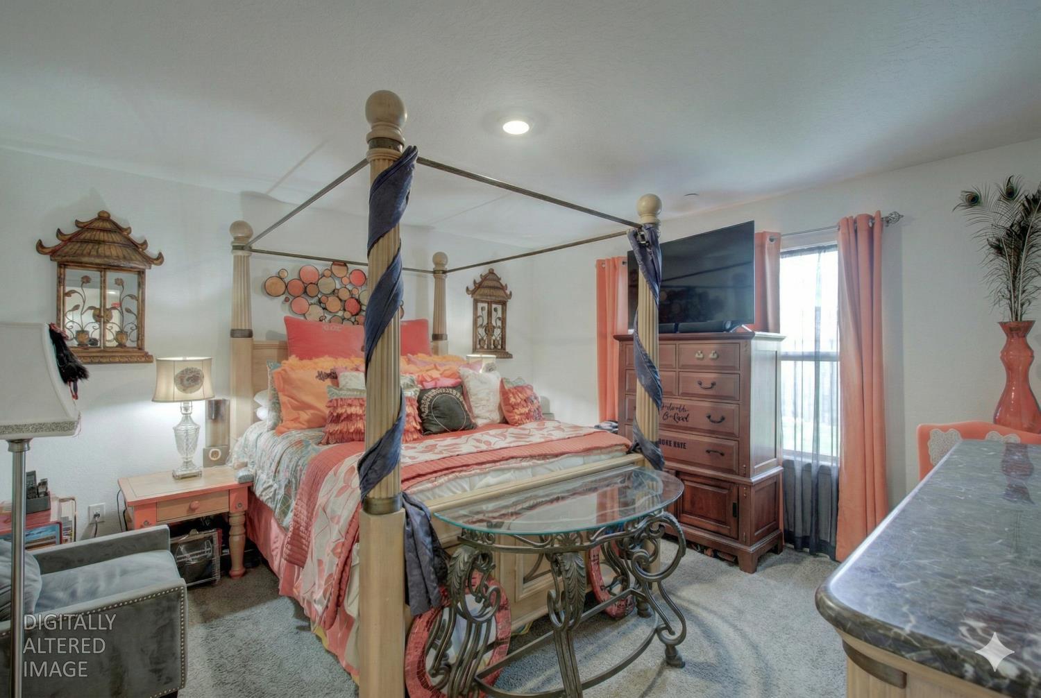295 Bryce Cyn Court Merced, CA 95341 - Photo 8 of 21 a bedroom with bed and a window