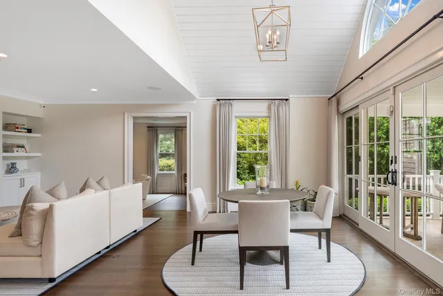 a kitchen with cabinets a center island and appliances